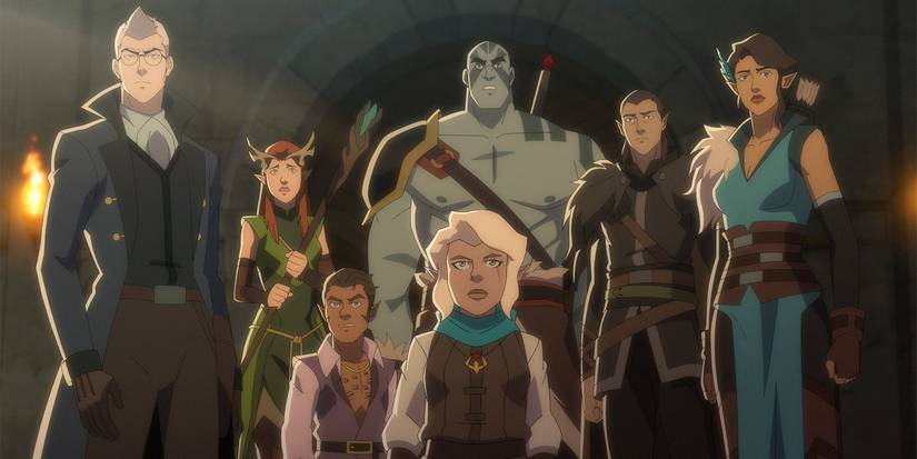 Vox Machina apkalpe stāv kopā ar ieročiem.