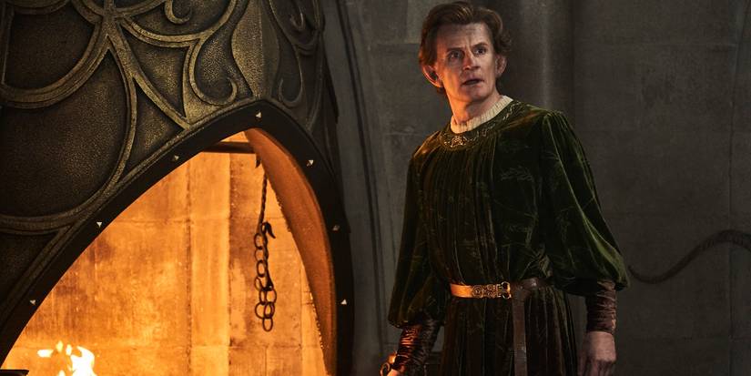 Charles Edwards standing by a forge in The Rings of Power Season 2 Episode 7