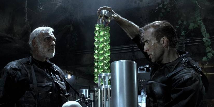Sean Connery and Nicolas Cage looking at a green tube in The Rock