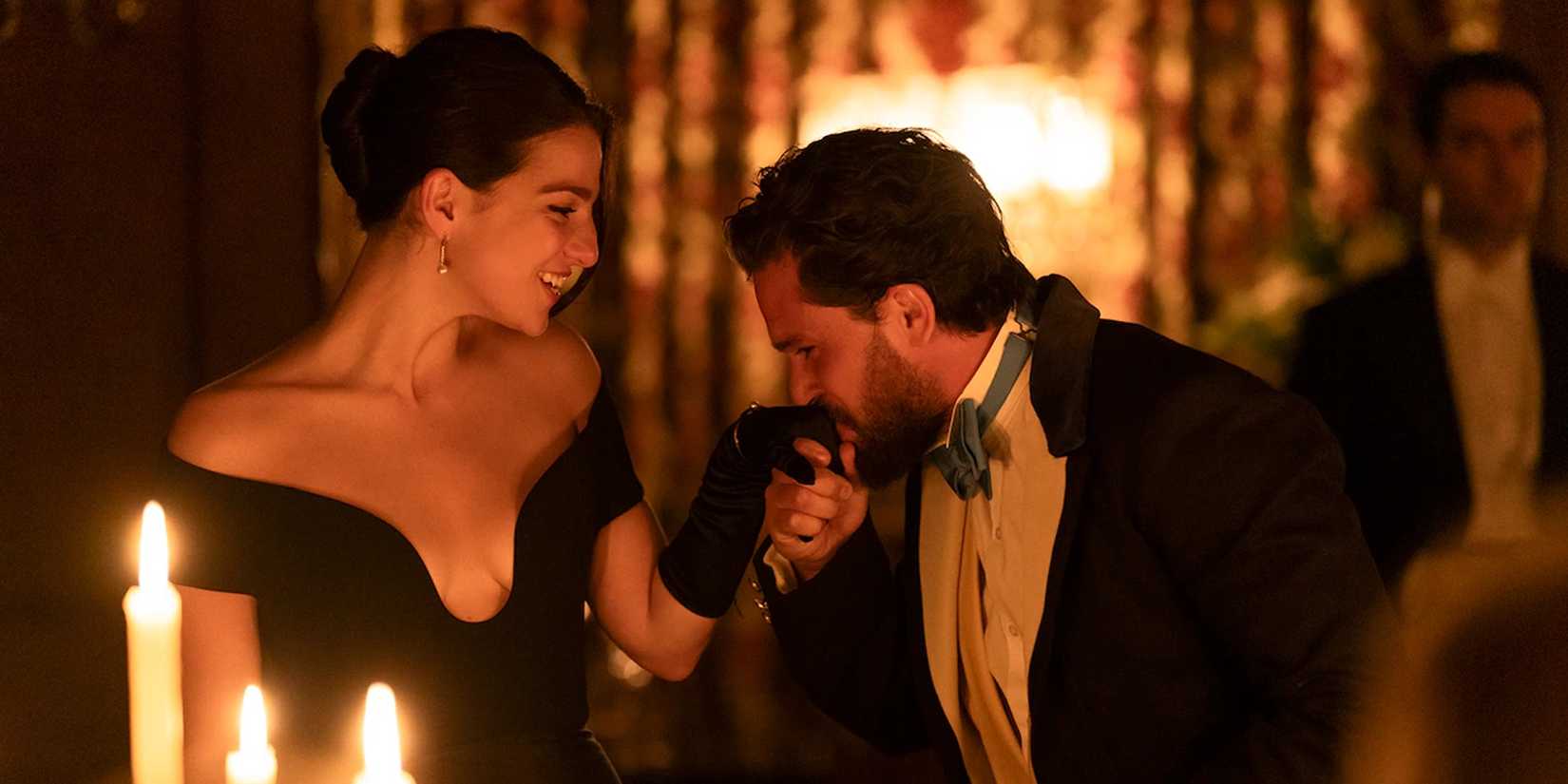 Henry Muck (Kit Harington) kisses Yasmin Kara-Hanani’s (Marisa Abela) hand in the Industry Season 3 finale