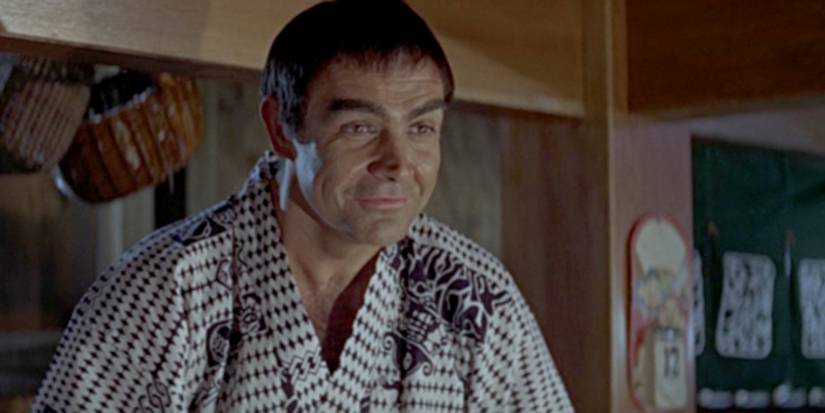 James Bond (Sean Connery) smiles as he dons a disguise as a Japanese man in 'You Only Live Twice' (1967).