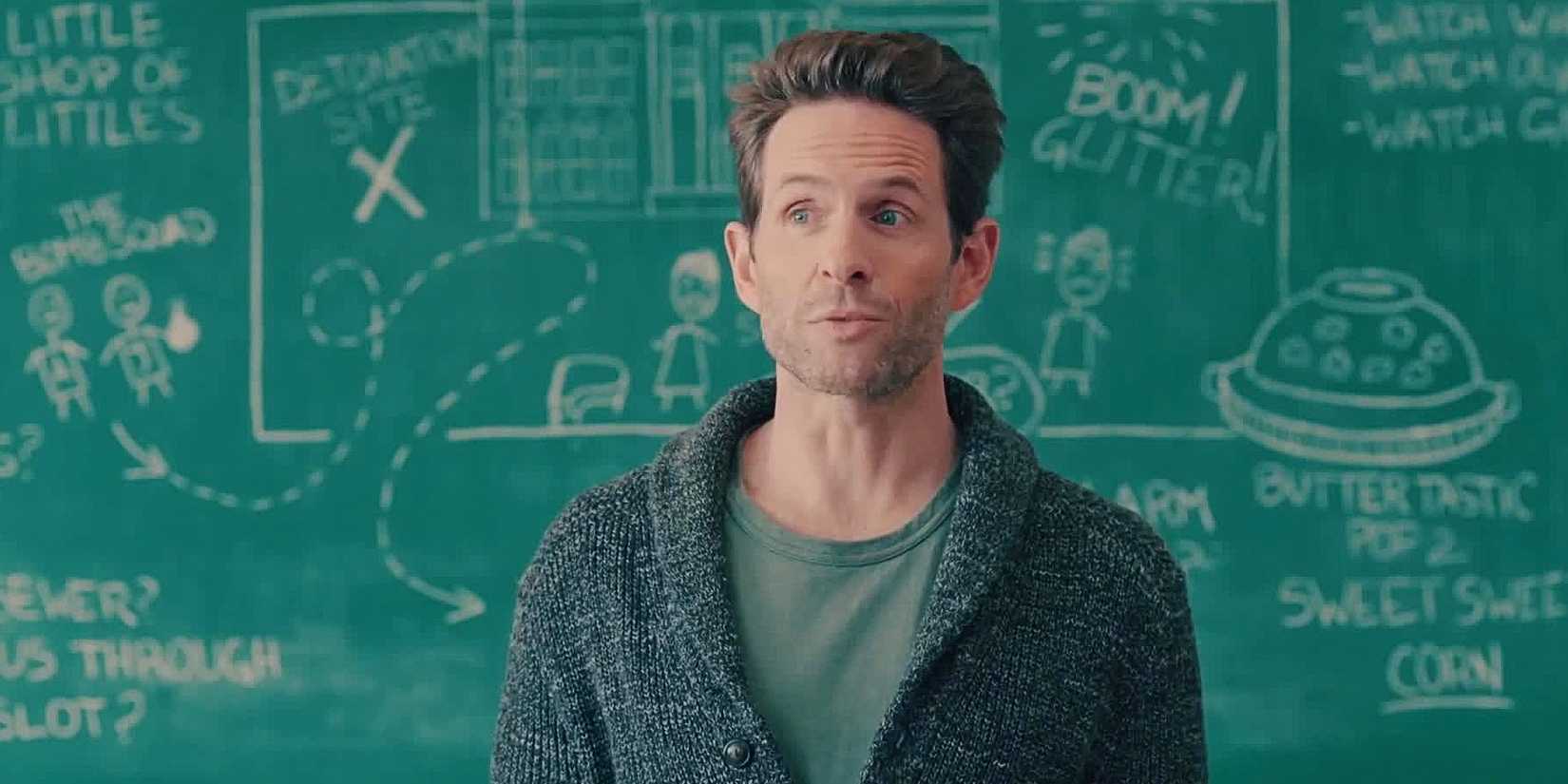 Glenn Howerton as Jack Griffin in 'A.P. Bio' standing in front of a chalkboard.