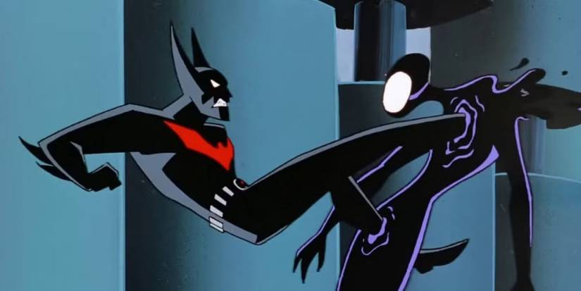 Batman kicks a hole through Inque in Batman Beyond.