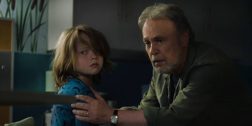 Billy Crystal holding onto Jacobi Jupe