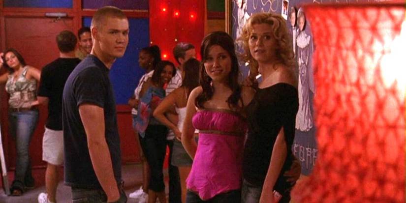 Brooke, Peyton, and Lucas standing and smiling in One Tree Hill