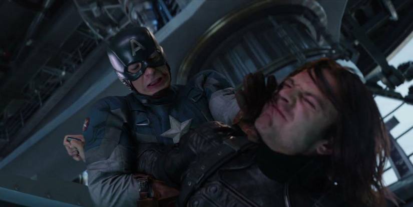 Captain America pushing Winter Soldier's face away as they fight in Captain America: The Winter Soldier.