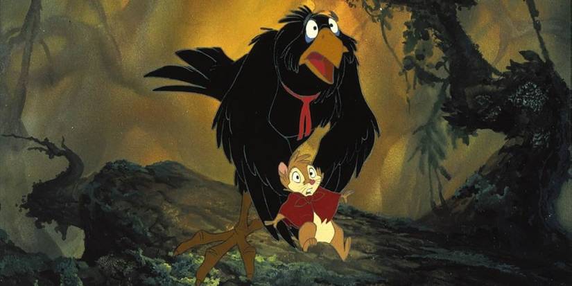 Jeremy (Dom DeLuise) and Mrs. Brisby (Elizabeth Hartman) startled in the dark forest in The Secret of NIMH.