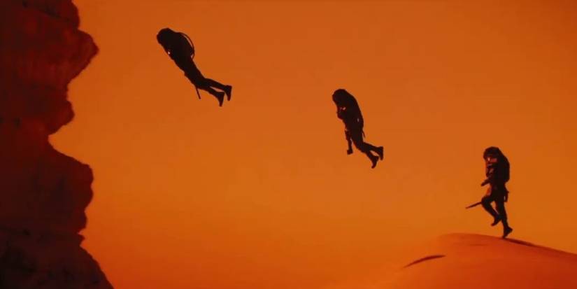 Three figures flying in the Dune: Part Two opening scene
