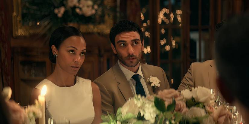 Amy (Zoe Saldaña) and Lino (Eugenio Mastrandrea) listen to a toast at their wedding in 'From Scratch'.