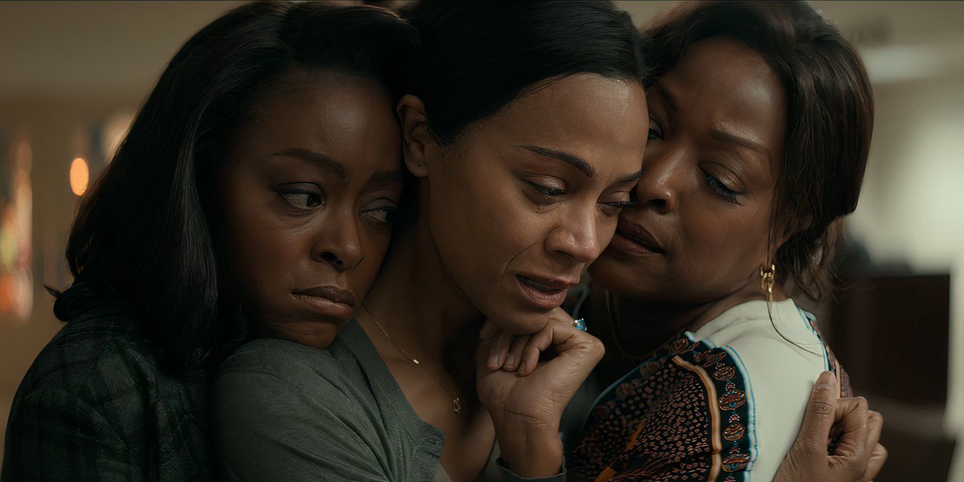 Zora (Danielle Deadwyler) and Lynn (Kellita Smith) console Amy (Zoe Saldaña) with a group hug in 'From Scratch'.