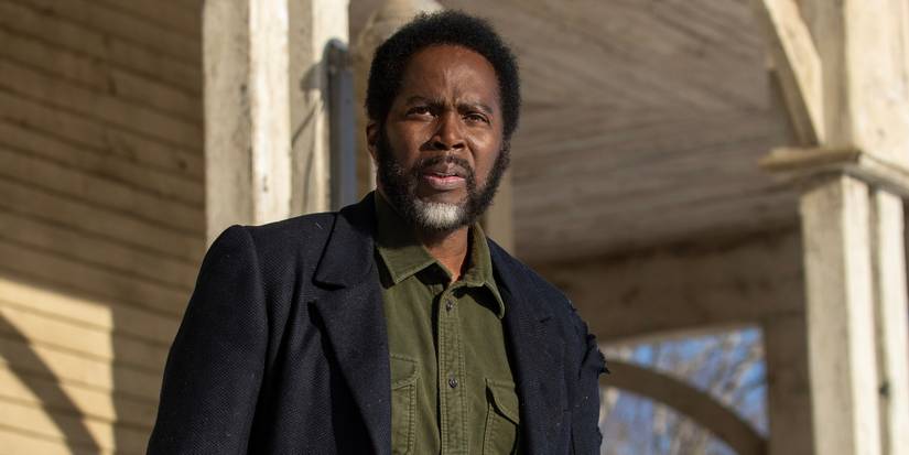Harold Perrineau standing on a house porch looking perplexed in From Season 3, Episode 6.