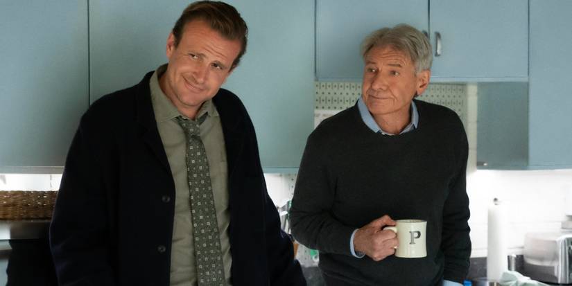 Harrison Ford holding coffee and Jason Segel leaning his head and smiling in Shrinking Season 1.