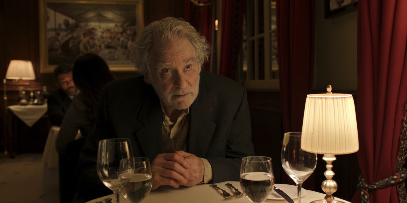 Kevin Kline's Stephen in Disclaimer, sititng at a fancy restaurant 