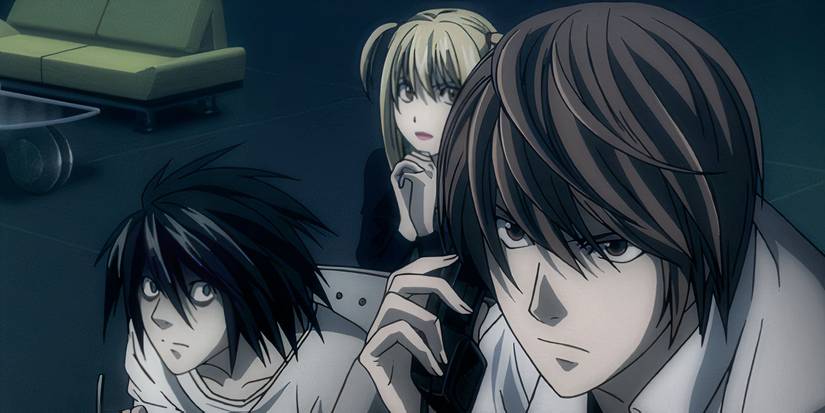 Light Yagami and L look serious in 'Death Note'.