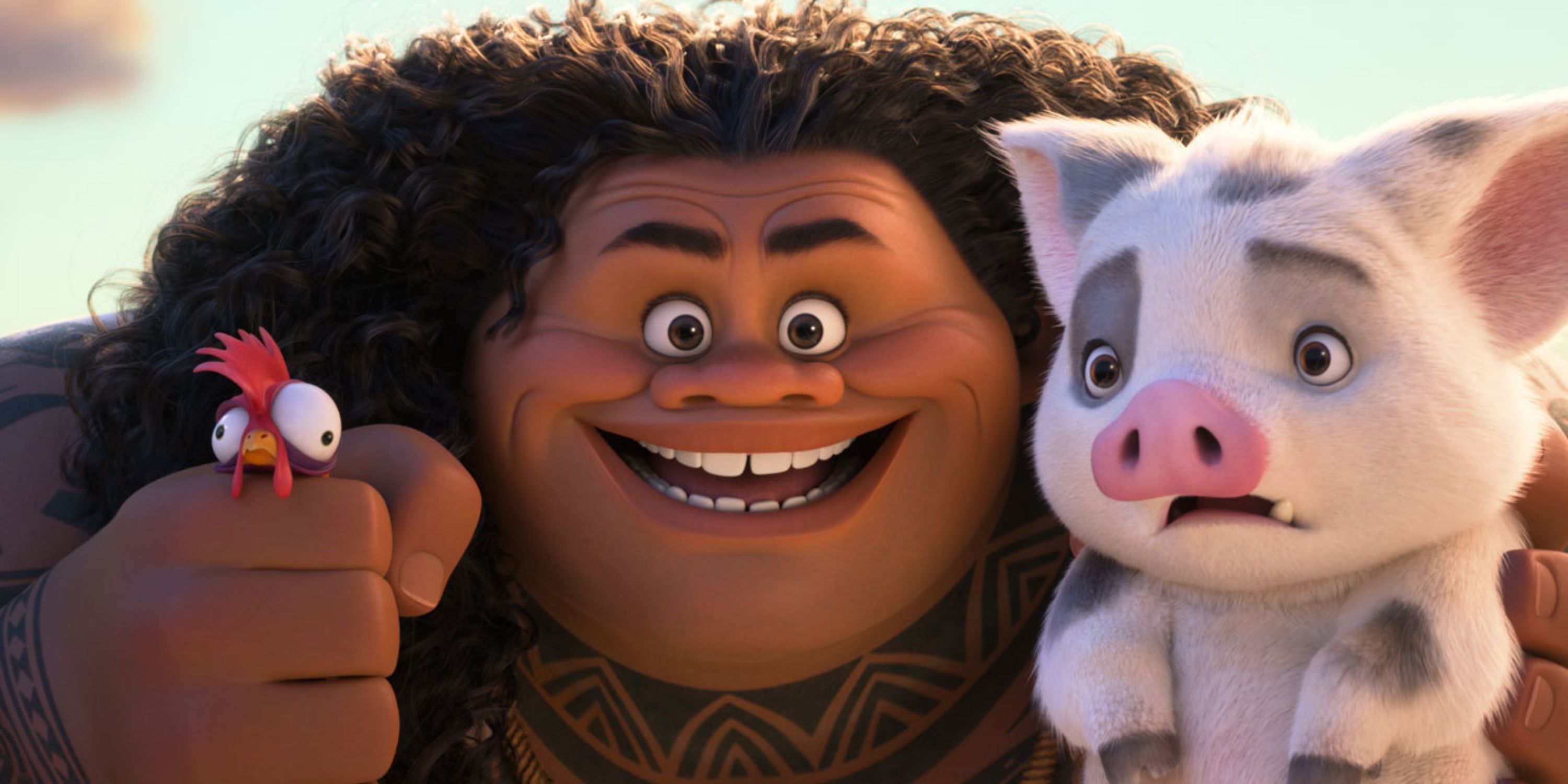 Maui (Dwayne Johnson) in extreme close-up with Pua in his left hand and Hei Hei in his right hand in Moana 2