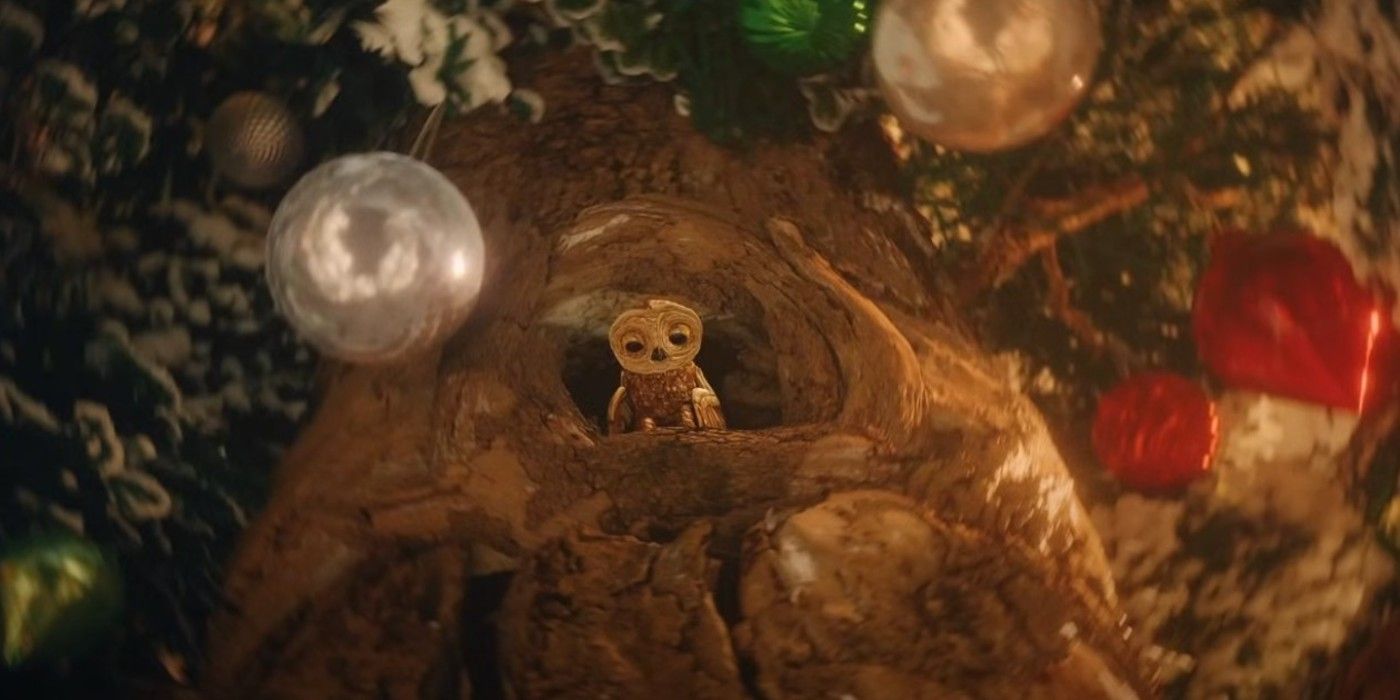 Moon, a young owl, stares down from a decorated Christmas Tree in An Almost Christmas Story