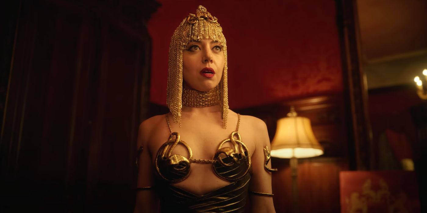 Wow Platinum is a gold-dressed femme fatale in Megalopolis (2024).