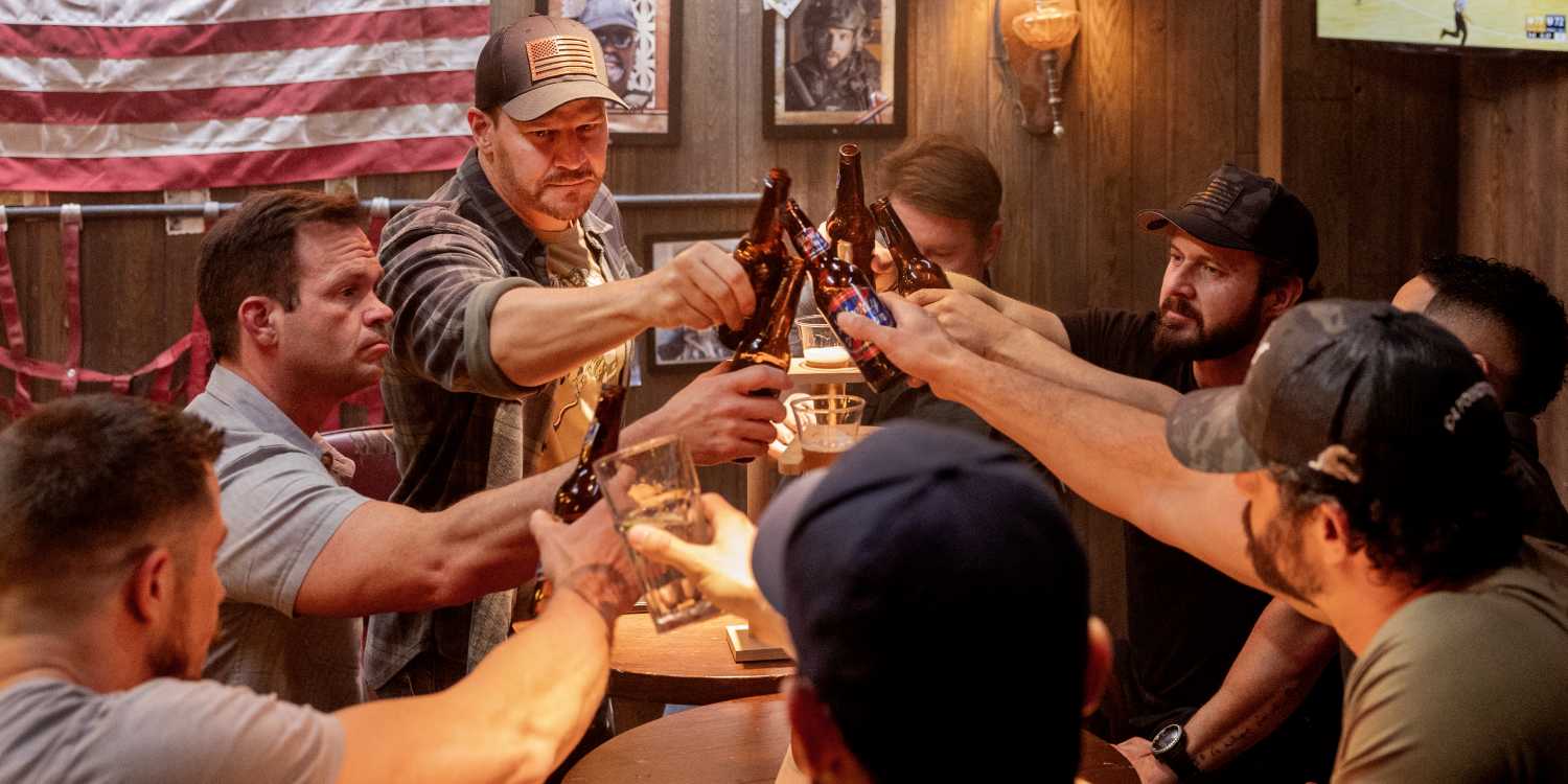 David Boreanaz as Jason Hayes clinking beer bottles with BRAVO Team in the series finale of SEAL Team