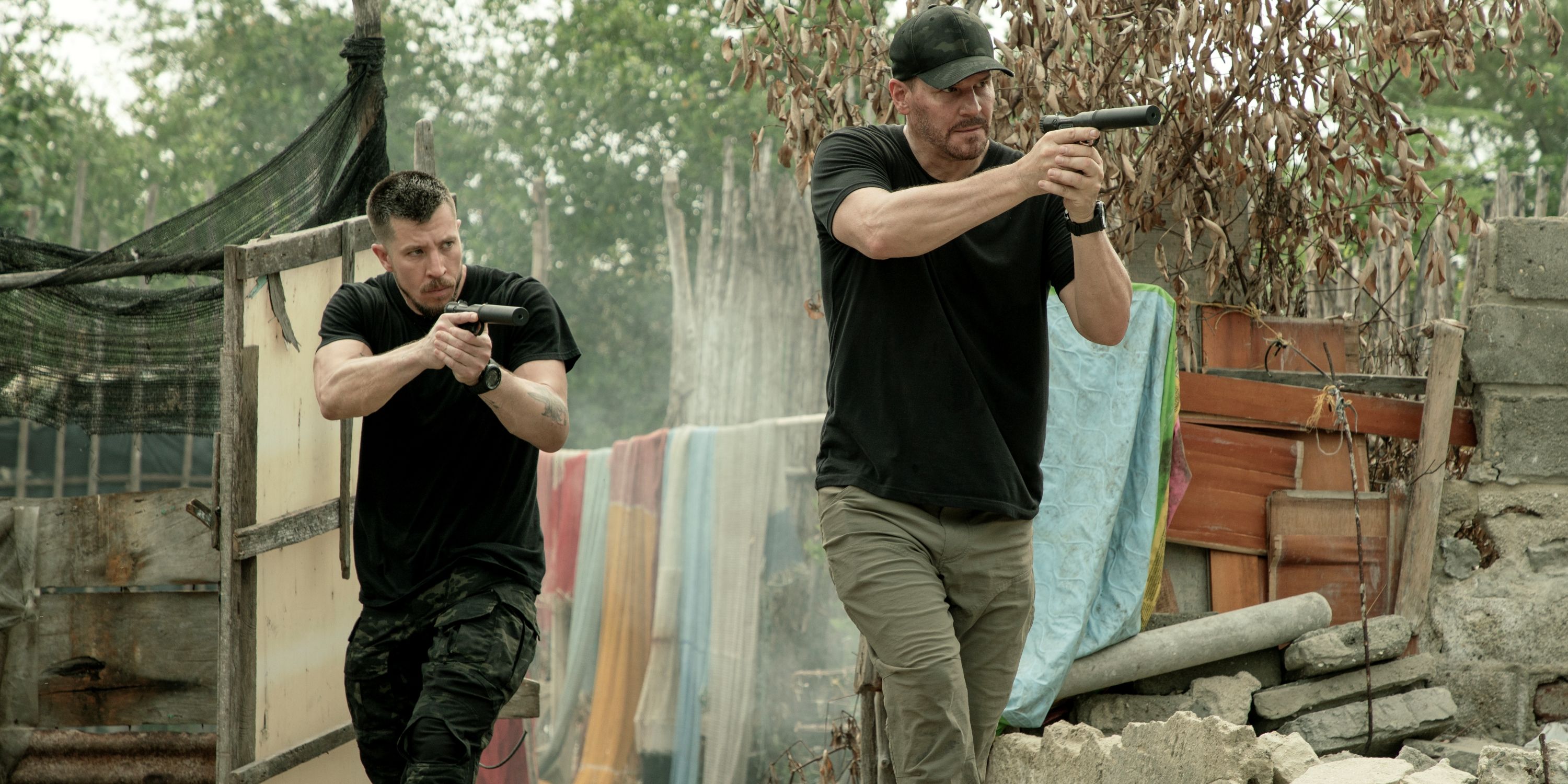 David Boreanaz as Jason Hayes and Beau Knapp as Drew with guns out in the series finale of SEAL Team