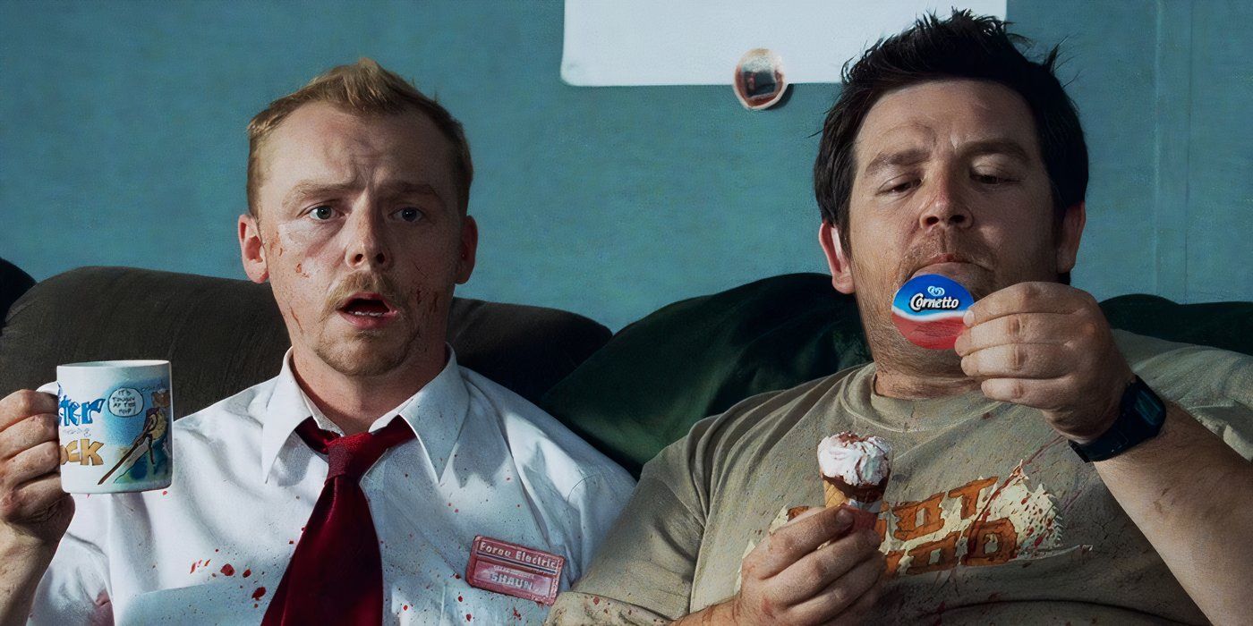 Nick Frost eats a Cornetto while sitting on the couch with Simon Pegg in 'Shaun of the Dead'.