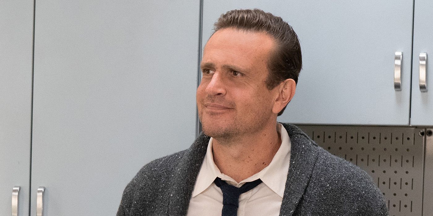 Jason Segel standing in a break room in Shrinking Season 2