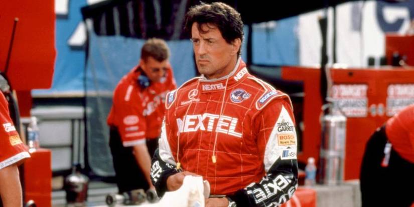 Sylvester Stallone next to his race car in 'Driven' (2001).