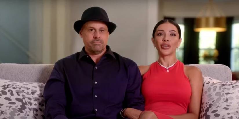 90 Day Fiance's Gino and Jasmine sitting on a couch in interview