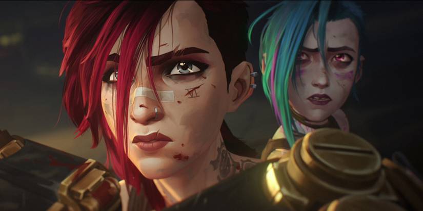 Vi dan Jinx berdiri bersebelahan di final Arcane Musim 2