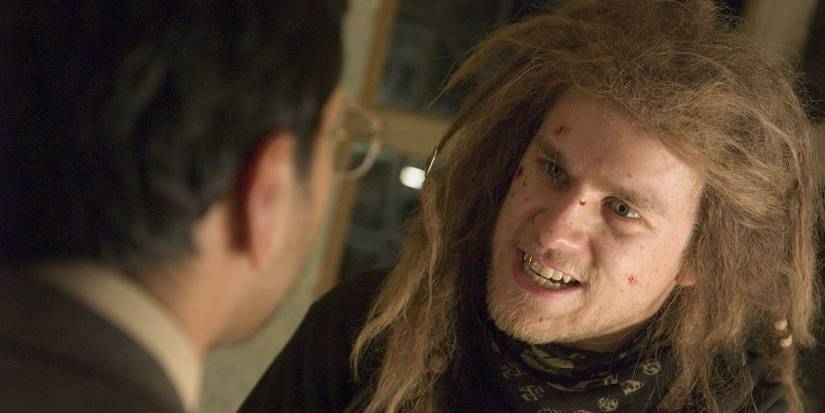 Clive Owen and Charlie Hunnam having an intense conversation in Children of Men.