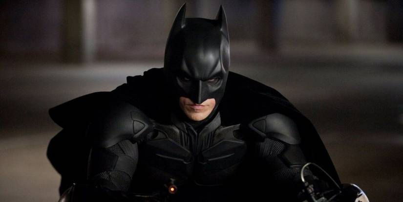 Christian Bale as Batman riding a motorcycle in Dark Knight