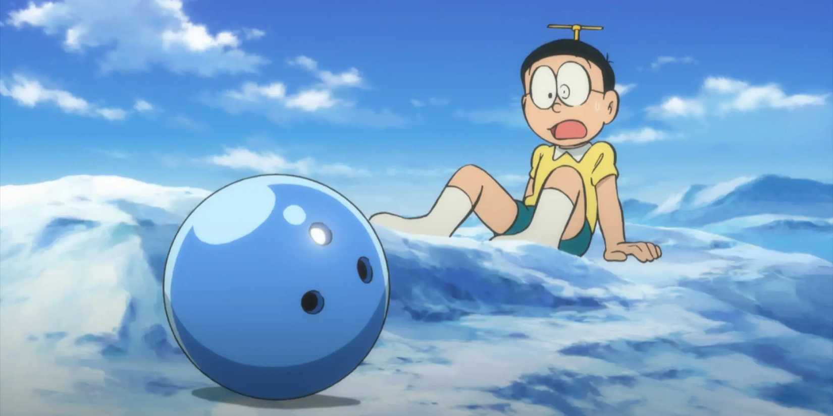 A boy on the floor looking confused