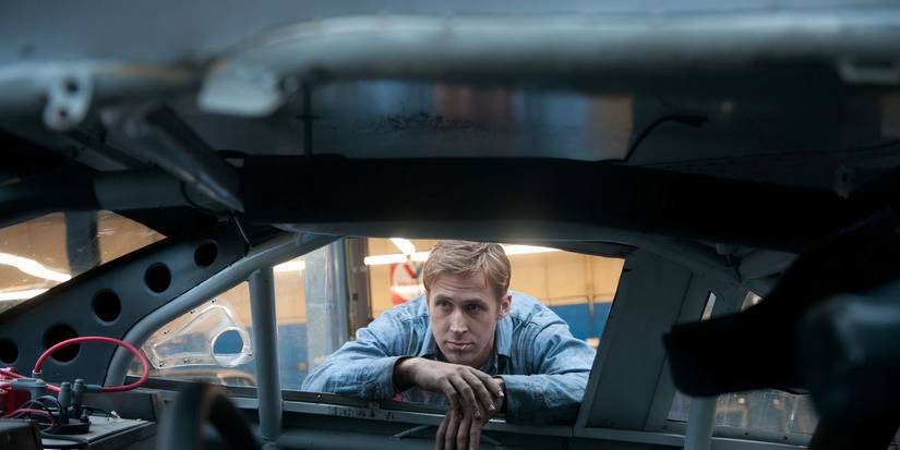 Ryan Gosling leaning on a car's open window in Drive