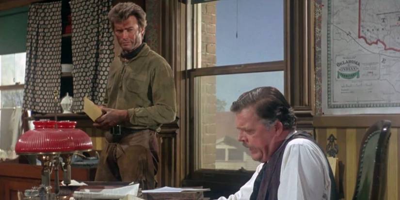 Jed Cooper (Clint Eastwood) talks with Judge Fenton (Pat Hingle) in Hang 'Em High