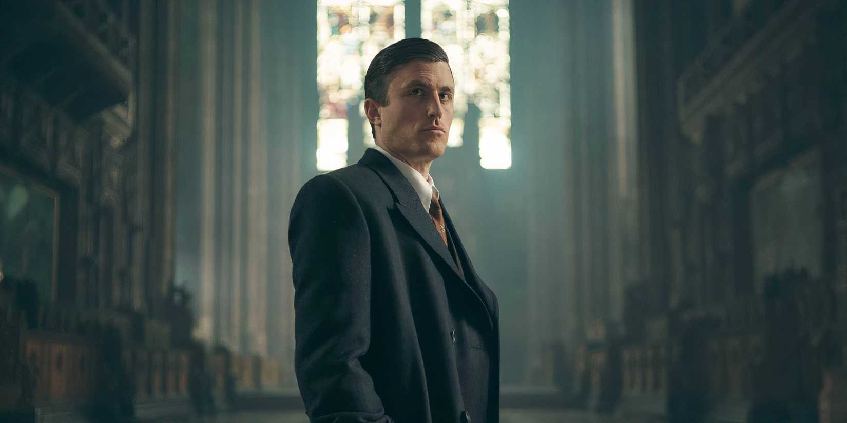 James Frecheville as Jack Nelson in Peaky Blinders standing tall.