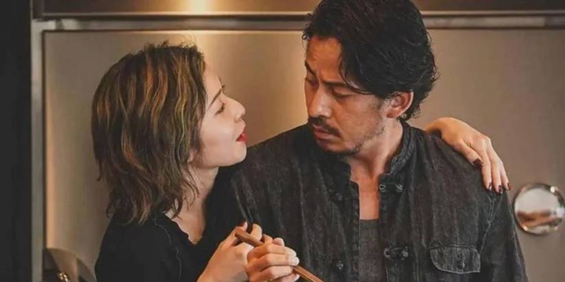 Junichi Okada and Kyoko gazing at each other in Hell Dogs