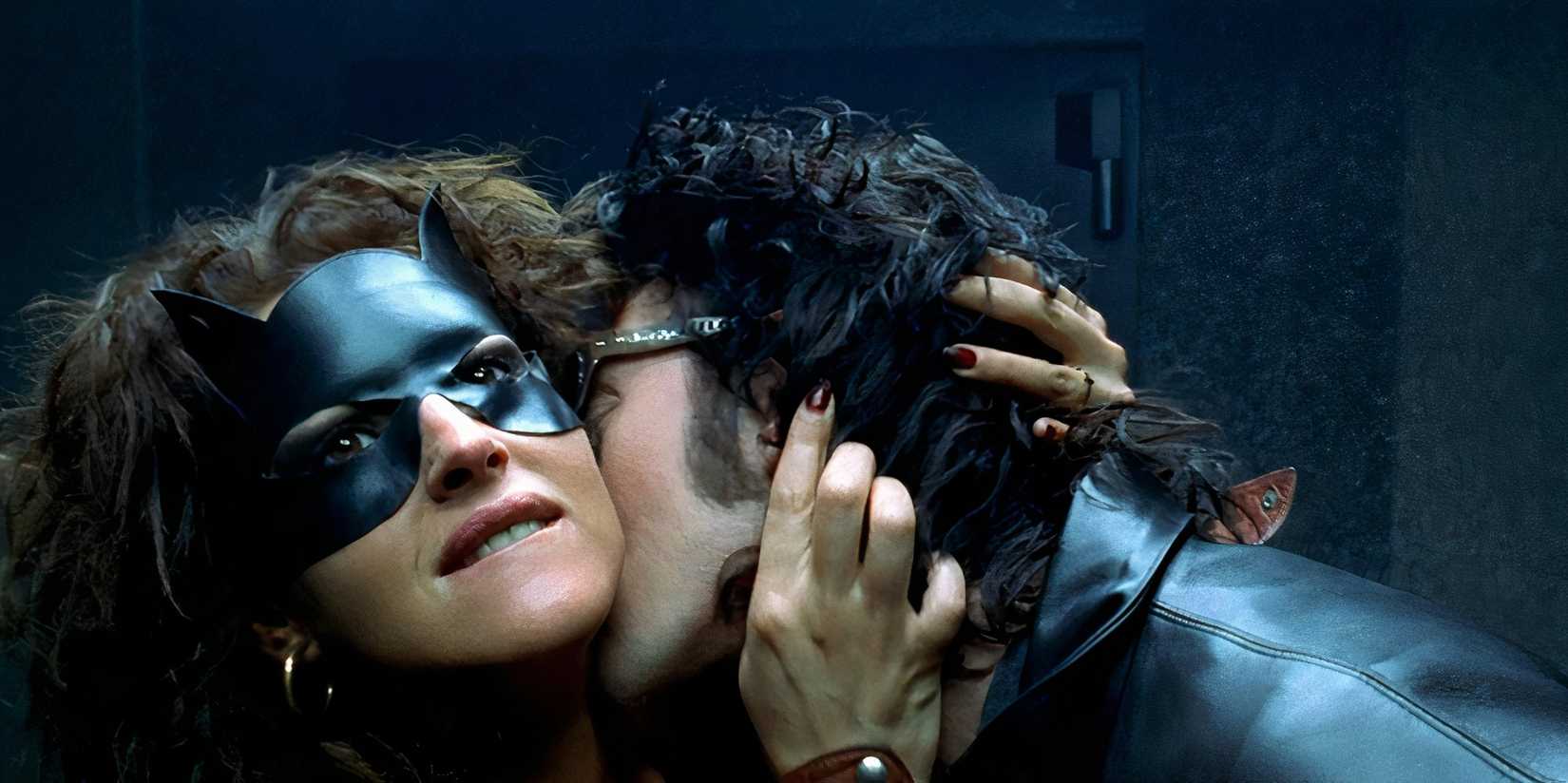 Monica Bellucci as Nathalie in Dobermann being kissed on the neck