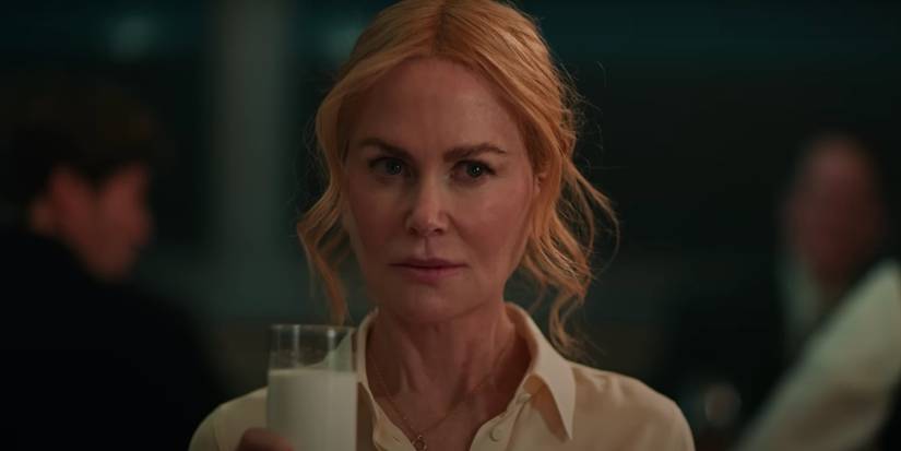 Nicole Kidman, holding a glass of milk, as Romy in Babygirl