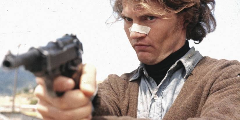 Scorpio (Andy Robinson) takes aim with his gun in 'Dirty Harry'