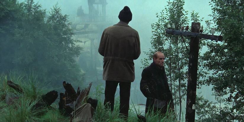 Two men in a misty mountain in Stalker