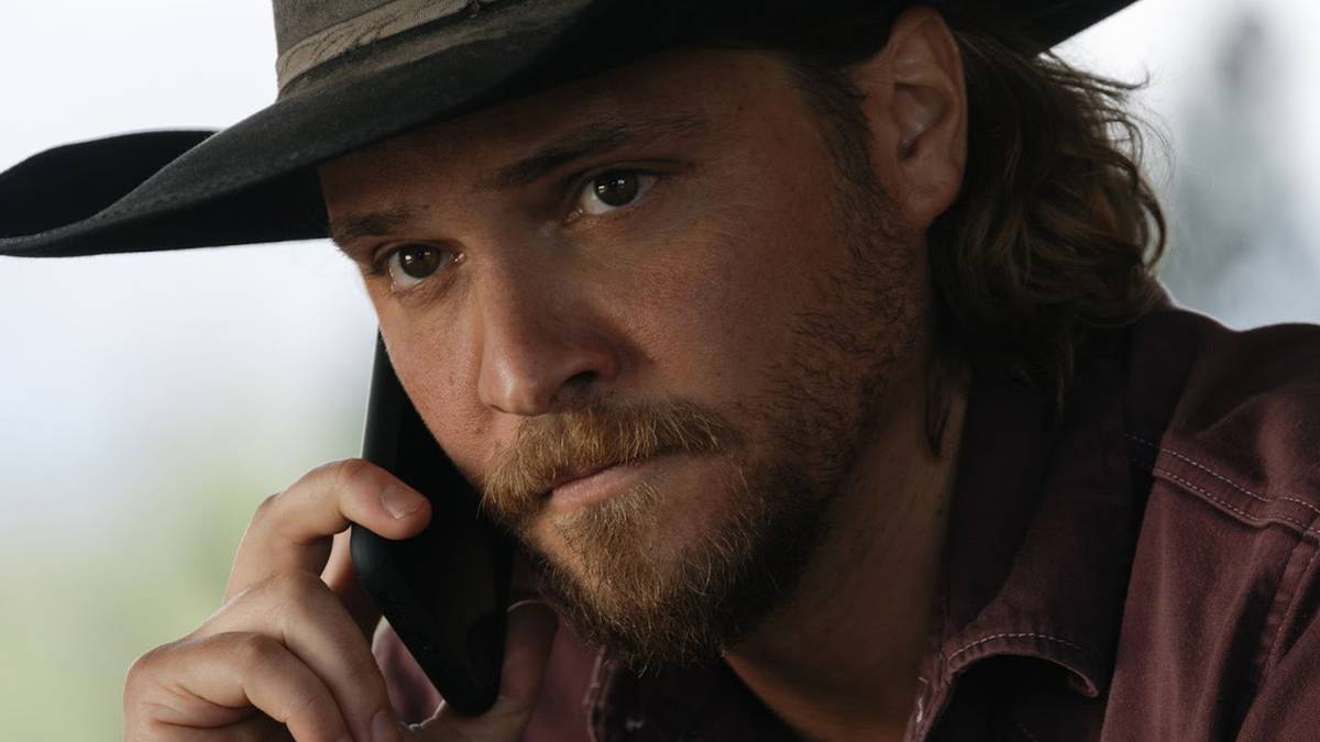 Luke Grimes as Kayce Dutton on the phone in Yellowstone Season 5 Episode 12.