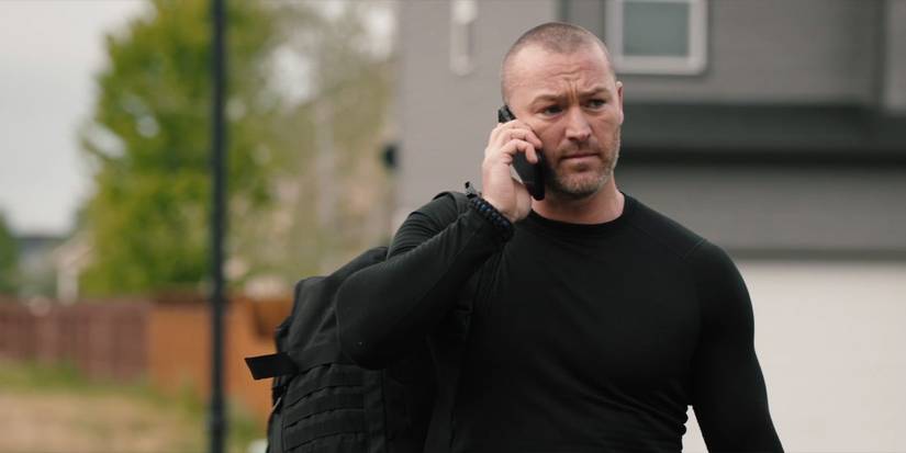 Jake McLaughlin as Cade McPhereson on the phone on Yellowstone