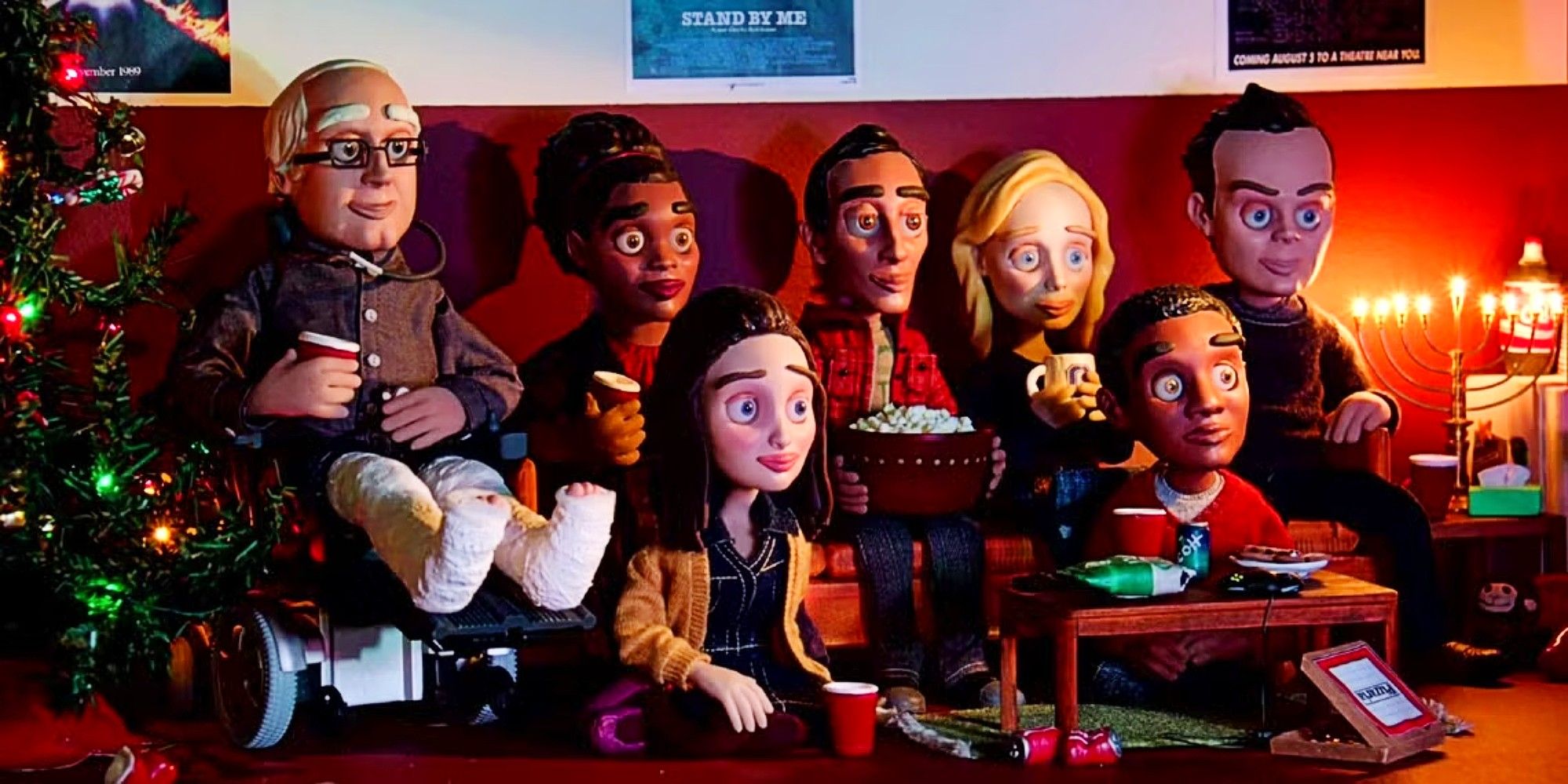 The cast in claymation in Abed's dorm room around the TV, in Community "Abed's Uncontrollable Christmas".