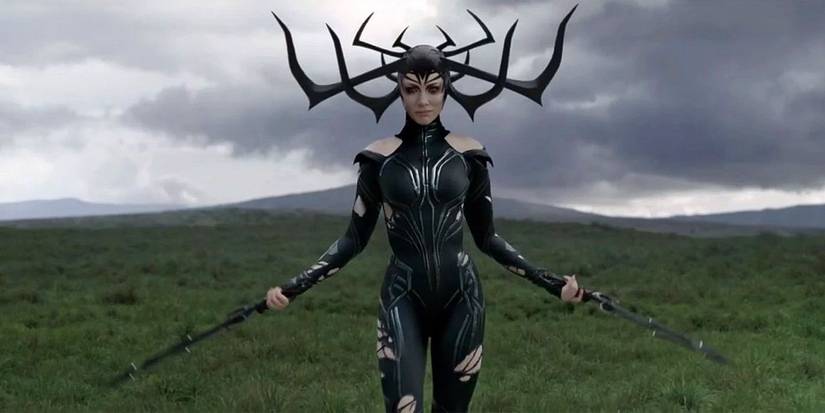 Cate Blanchett as Hela walking in an open field in Thor: Ragnarok.
