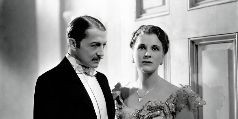 A man looking at a woman in Cavalcade