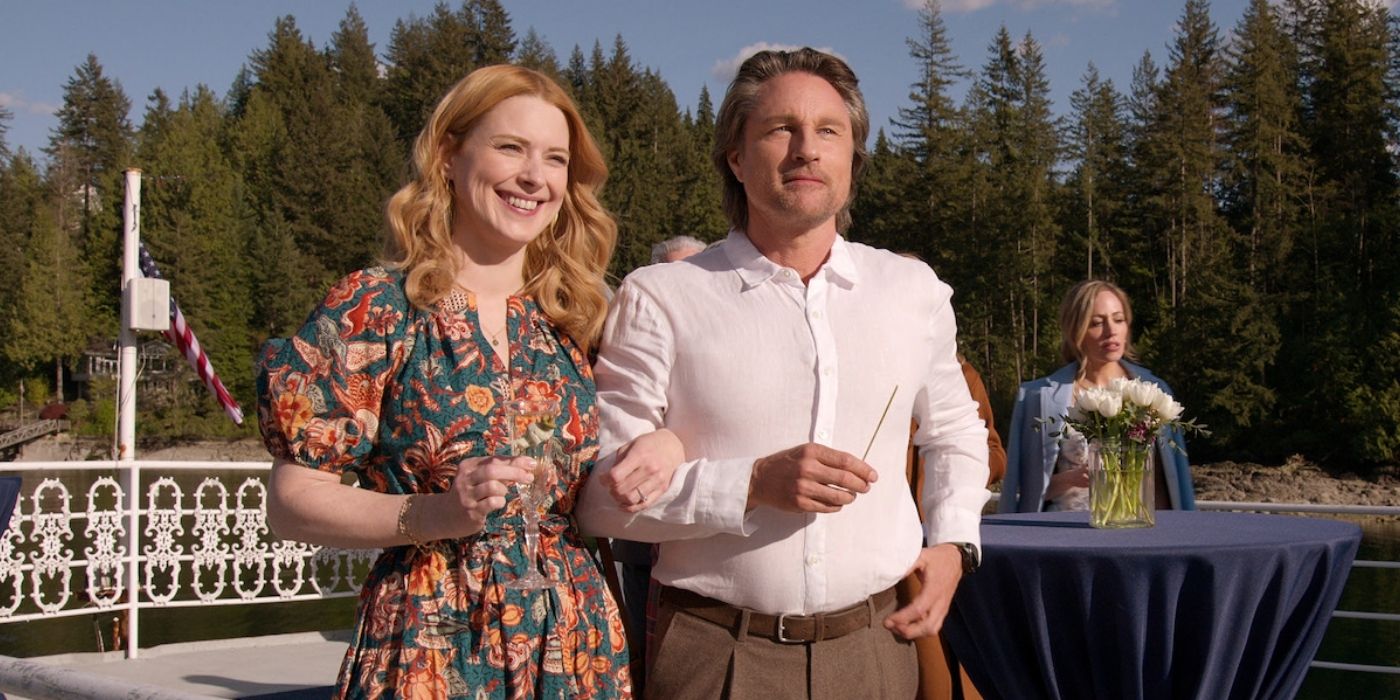 Alexandra Breckenridge and Martin Henderson walk arm in arm rehearsing a wedding in Virgin River Season 6.
