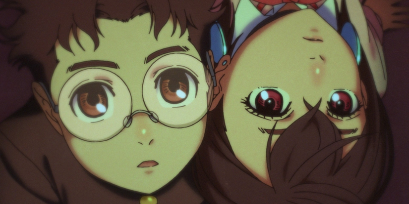 The anime Dan Da Dan main characters leaning against each other whilst looking up. 