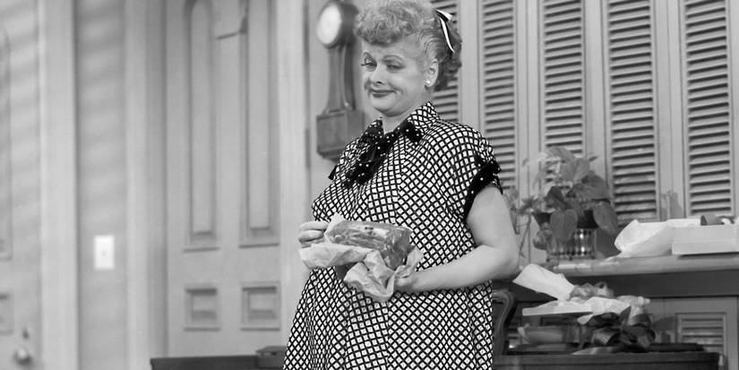 I Love Lucy's Lucy smiling while very visibly pregnant