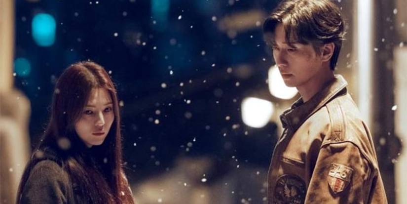 Park Seo-joon, Han So-hee, as Tae-sang and Chae-rok in the snow in Gyeongsoeong Creature.