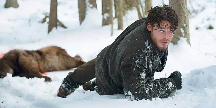 Bill Haskell (Richard Madden) crawls away from a dead wolf on 'Klondike'.