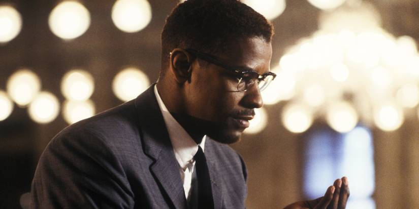 Malcolm (Washington) sitting and contemplating alone in Malcolm X